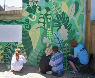 Children painting a mural: HOPE Brighton '11
