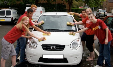 Street Invasion youth wash cars